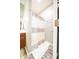 This modern bathroom features a stand-up shower with a white shower curtain at 7895 E 175 N, Franklin, IN 46131