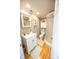 This cozy bathroom includes a white vanity, shower, and charming decorative elements at 7895 E 175 N, Franklin, IN 46131