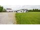 Exterior view of the home featuring a barn, garage and house at 7895 E 175 N, Franklin, IN 46131