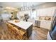 Spacious kitchen with a large island, modern appliances, and ample seating for casual dining at 7895 E 175 N, Franklin, IN 46131