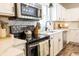 Well-equipped kitchen featuring stainless steel appliances, ample counter space, and modern fixtures, blending style with functionality at 7895 E 175 N, Franklin, IN 46131