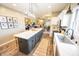 Open-concept kitchen with a large island, modern appliances, and seamless flow to living spaces, ideal for entertaining at 7895 E 175 N, Franklin, IN 46131