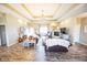 Open-concept living room featuring hardwood floors, a fireplace, and abundant natural light at 7895 E 175 N, Franklin, IN 46131