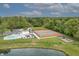 Aerial shot of a community pool, tennis courts, and playground at 8029 Castle Lake Rd, Indianapolis, IN 46256