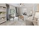 Cozy living room with neutral tones, comfortable seating, and bright natural light at 8029 Castle Lake Rd, Indianapolis, IN 46256