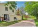 Exterior shot showing back of property, patio, lawn and address marker along path at 9054 Cinnebar Dr, Indianapolis, IN 46268