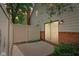 Exterior view of a home with a private patio area and a fence for added privacy at 9054 Cinnebar Dr, Indianapolis, IN 46268