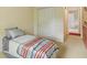 Bedroom featuring neutral walls, carpet flooring, and closet space at 9054 Cinnebar Dr, Indianapolis, IN 46268