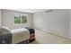 Bedroom with a large window and carpet floors at 9054 Cinnebar Dr, Indianapolis, IN 46268