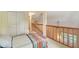 Bedroom with carpet flooring and view of the downstairs at 9054 Cinnebar Dr, Indianapolis, IN 46268