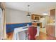 Open dining area featuring hardwood floors and a pendant light fixture at 9054 Cinnebar Dr, Indianapolis, IN 46268