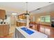 Bright kitchen with skylight open to the dining and living areas at 9054 Cinnebar Dr, Indianapolis, IN 46268