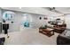 Finished basement offers a projector, comfortable seating, and unique architectural details at 9311 Windrift Way, Zionsville, IN 46077