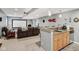 Spacious finished basement with bar area and comfortable seating, perfect for entertaining at 9311 Windrift Way, Zionsville, IN 46077