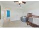 Cozy Bedroom with view to an open doorway leading to an adjoining room at 9311 Windrift Way, Zionsville, IN 46077