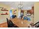 Charming dining room with hardwood floors is adjacent to the kitchen area, making it perfect for entertaining at 9311 Windrift Way, Zionsville, IN 46077