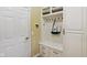 Organized mudroom features built-in storage, coat hooks, and drawers, creating a clutter-free entryway at 9311 Windrift Way, Zionsville, IN 46077