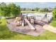 Community playground with a lake, mature trees and proximity to the community pool at 9311 Windrift Way, Zionsville, IN 46077
