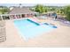 Community pool with ample seating, and mature trees in a Gathering friendly neighborhood at 9311 Windrift Way, Zionsville, IN 46077