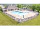 Community pool with ample seating, playground, and mature trees in a Gathering friendly neighborhood at 9311 Windrift Way, Zionsville, IN 46077