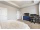 Bedroom with carpeting, a blue dresser, and a dedicated desk space at 965 Astor Ln, Carmel, IN 46032