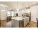 Spacious kitchen island seamlessly connects to the living room, enhancing open-concept living and entertaining at 965 Astor Ln, Carmel, IN 46032