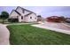 Exterior view of a home showcasing a covered pool, and wooden pergola enhancing outdoor living at 1026 Summer Way Dr, Shelbyville, IN 46176