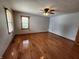 Spacious bedroom with hardwood floors and a ceiling fan at 1026 Summer Way Dr, Shelbyville, IN 46176