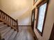 Entryway with carpeted stairs and a dark wooden door with a glass window at 1026 Summer Way Dr, Shelbyville, IN 46176