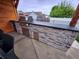 Outdoor kitchen featuring a stone facade with a built-in grill, stainless steel cabinets, and a sleek countertop for outdoor entertaining at 1026 Summer Way Dr, Shelbyville, IN 46176