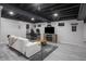 Basement with tiled floor features a gaming setup and a sitting area at 107 W Columbine Ln, Westfield, IN 46074