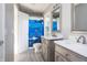 Bathroom with double vanity, modern sinks and faucets, and a colorful shower curtain at 107 W Columbine Ln, Westfield, IN 46074