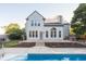 A beautiful backyard view of this home with a patio and pool, great for enjoying outdoor living and entertaining guests at 107 W Columbine Ln, Westfield, IN 46074