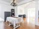 Open concept living area with wood floors and abundant natural light at 107 W Columbine Ln, Westfield, IN 46074