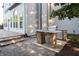 A brick outdoor kitchen with a built-in grill makes this backyard perfect for dining and entertaining friends and Gathering at 107 W Columbine Ln, Westfield, IN 46074