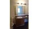 Modest bathroom featuring a single sink vanity and standard toilet at 10795 Albertson Dr, Indianapolis, IN 46231