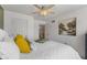 Airy bedroom with neutral walls, natural light, and views of the staircase at 10988 Eaton Ct, Fishers, IN 46038