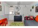 Bedroom featuring gray walls, a media center, and fun decorations for children at 10988 Eaton Ct, Fishers, IN 46038