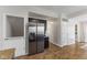 Open kitchen with stainless steel refrigerator at 10988 Eaton Ct, Fishers, IN 46038