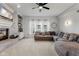 Comfortable living room with large sectional sofa and lots of light at 10988 Eaton Ct, Fishers, IN 46038