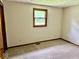 Bedroom featuring carpeting and natural light from a double window at 1103 Canal St, Anderson, IN 46012