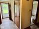 Entry featuring new flooring, a front door view, and a closet for storage at 1103 Canal St, Anderson, IN 46012