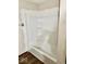Shower featuring shower/tub combo with built-in shelves at 1103 Canal St, Anderson, IN 46012
