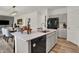 Modern kitchen with stainless steel appliances, light countertops and ample cabinet space at 11912 Vale St, Indianapolis, IN 46235