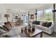Spacious open concept living room seamlessly integrates with the dining and kitchen area at 11912 Vale St, Indianapolis, IN 46235