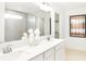 Bathroom with dual sinks, white quartz countertops, and a glass-enclosed shower at 1239 Thornwood Dr, Greenwood, IN 46143
