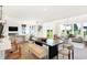 Bright open-concept living and dining area with modern finishes and abundant natural light at 1239 Thornwood Dr, Greenwood, IN 46143