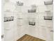 Well-organized pantry with wire shelving for ample storage of kitchen essentials at 1239 Thornwood Dr, Greenwood, IN 46143