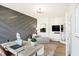 Well-appointed study featuring a gray accent wall, a modern desk, and comfortable seating at 1239 Thornwood Dr, Greenwood, IN 46143
