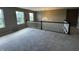 Large loft space with ample natural light and neutral carpeting at 14462 Brook Meadow Dr, McCordsville, IN 46055